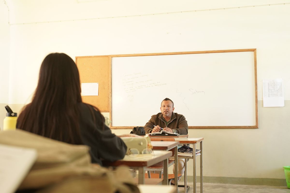 Group of Students collaborating with English Teacher at College Ste Marie